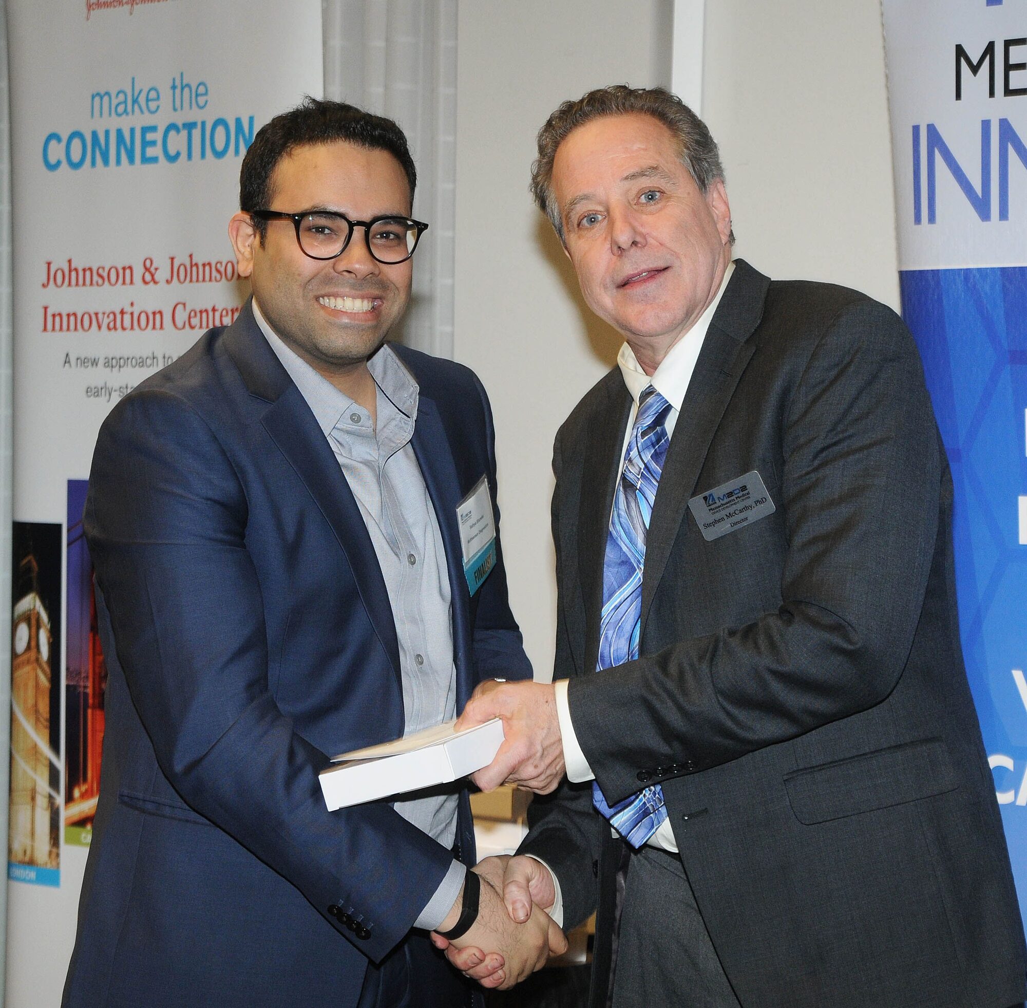 AIDAR Health founder accepting recognition at the M2D2 $200K Challenge medtech competition.